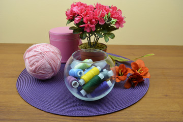 Glass bowl with coils of threads