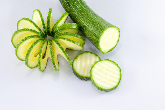 Fresh cutted zucchini isolated on a white background.