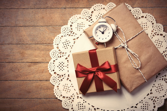 gifts and clock on napkin