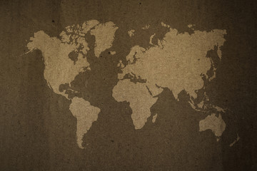 Fototapeta na wymiar Cardboard paper texture , process in vintage style with world map