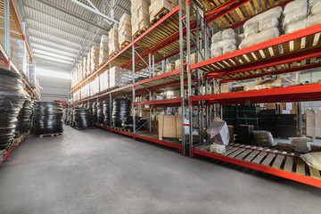 Long shelves with a variety of boxes and containers.