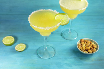 Lemon Margarita cocktails with  limes and copy space