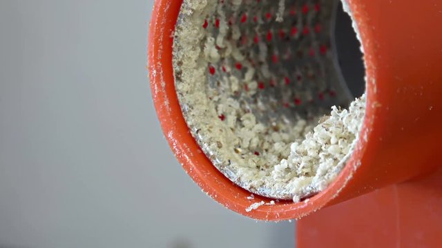 Nuts are minced on grinder