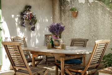 Outdoor terrace with wooden furniture