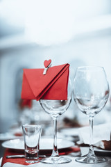 wine glasses with envelope and heart
