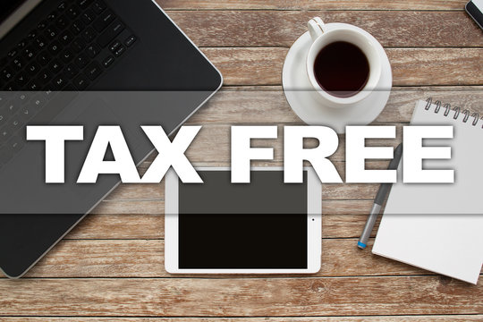 Tablet on desktop with tax free text.