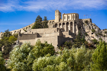 Fototapeta na wymiar Citadel of Sisteron and its fortifications in summer. Alpes de Haute Provence, Southern Alps, France