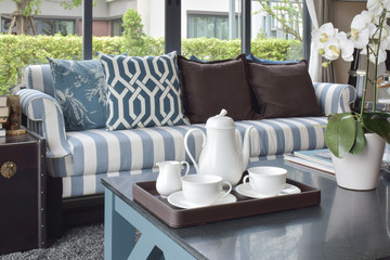 tray of tea cup and plant on white table in luxury living room at home