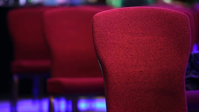 Stage lights tests and conference chairs before event