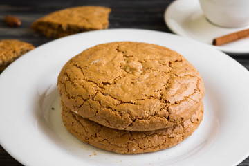 Cookies with almonds on a white plate. Tasty dessert.