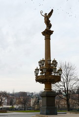 Fototapeta na wymiar The statue of the Muse next to the Rudolfinum in Prague.