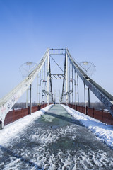 pedestrian bridge over the river in the city. Kiev, Dnipro