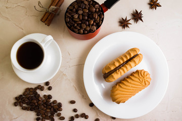 Biscuit sandwich with caramelized milk on a marble table. Tasty dessert.