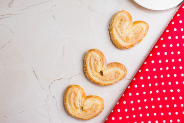 Berliner Cookies in a white plate on a marble table. Tasty dessert.