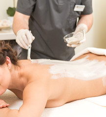Obraz na płótnie Canvas Massage on a woman at spa salon