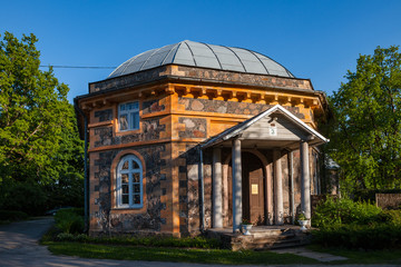 Fototapeta na wymiar Old stone colorful house near Krimulda palace in Gauja National Park near Sigulda, Latvia.