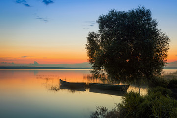morning landscape boat on the lake