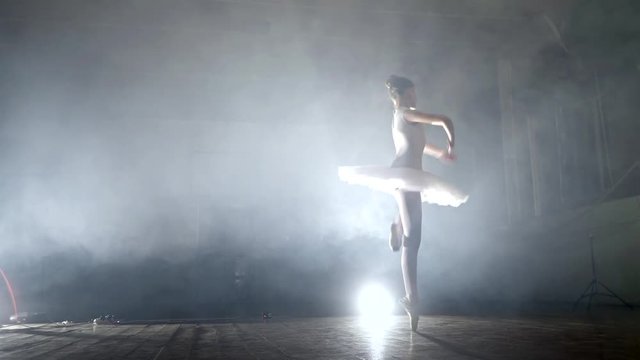 girl dancing ballet on stage