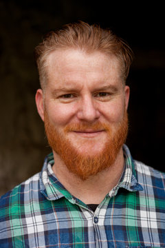 Portrait of red haired man with long beard