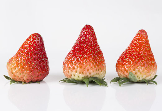 Delicious strawberries on a white background