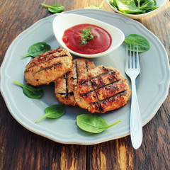 Beef or pork meat barbecue burgers grilled on bbq fire grill