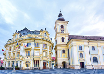 Fototapeta na wymiar Sibiu city downtown with houses at the central square near the mayor building, rainy day, Romania