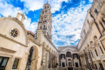 Ancient roman city Split. / Marble ancient roman architecture in city center of town Split, view at square Peristil in front of cathedral Saint Domnius and  bell tower landmarks, Croatia.
