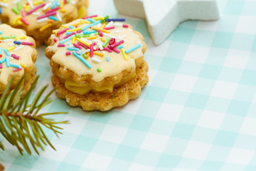 Christmas sweets on checkered tablecloth