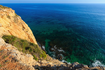 Fototapeta na wymiar Summer Atlantic rocky coast (Algarve, Portugal).