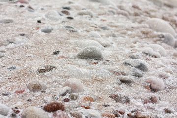 Winter pattern on the sea rocks