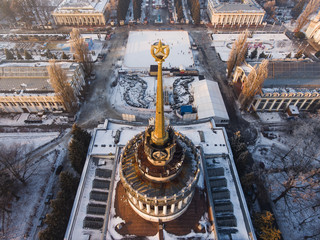 Aerial view of soviet building in Kiev, Ukraine. Building with star on the top, rink on background