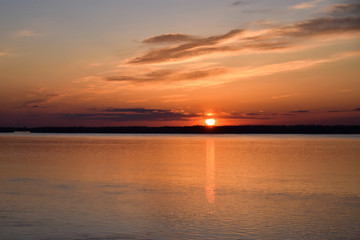 Fototapeta na wymiar Fiery red sunset over the Amur River