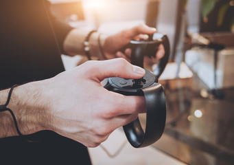 The young man plays a game at the office.