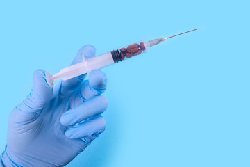 Coffee drug dependence on coffee, with a dose syringe