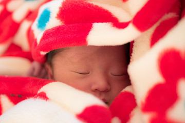 sleeping japanese newborn baby