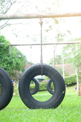 Old tires be made is seat in public park..