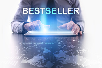 Businessman is using tablet pc and selecting bestseller.