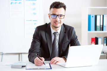 Businessman working with laptop