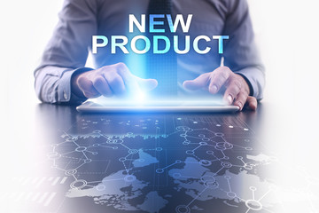 Businessman is using tablet pc and selecting new product.