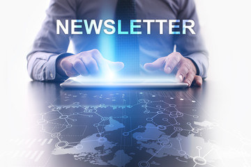Businessman is using tablet pc and selecting newsletter.