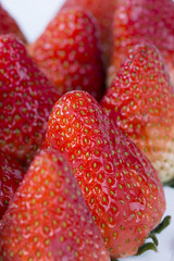 Delicious strawberries on a white background