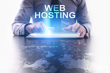 Businessman is using tablet pc and selecting web hosting.