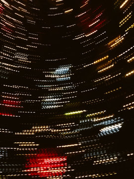 Blurred motion defocused lights colorful background