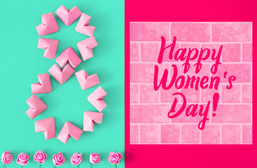 Happy International Women’s Day celebrate on March 8 CARD. rose-color paper hearts shape figure eight 8 on a green background