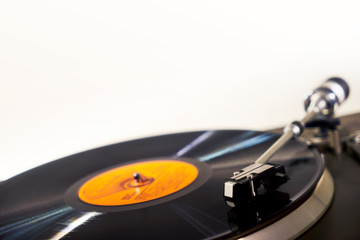 Gramophone and record to listen to. Included gramophone and the torque plate close-up on a bright background    