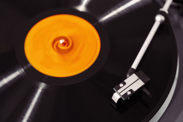 Gramophone and record to listen to. Included gramophone and the torque plate close-up on a bright background    