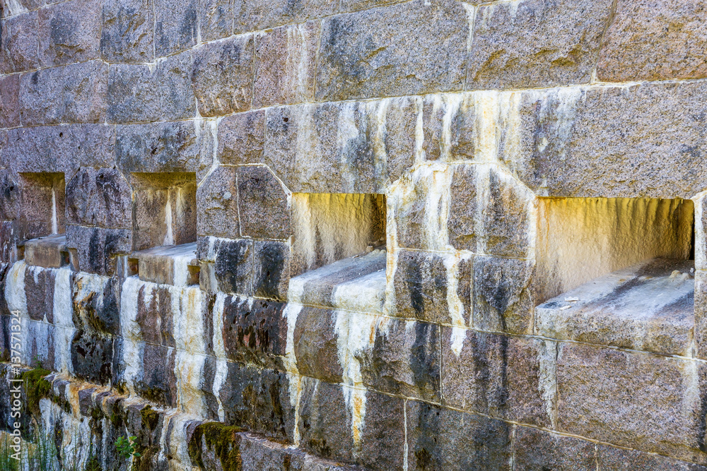 Wall mural Loopholes in an old fortress embankment