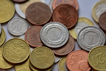 mix of coins and banknotes PLN and EUR