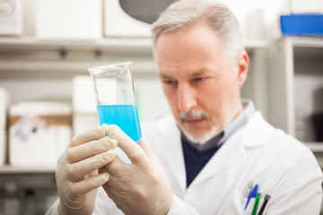 Scientist holding a test tube