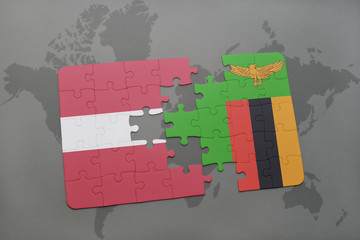 puzzle with the national flag of latvia and zambia on a world map